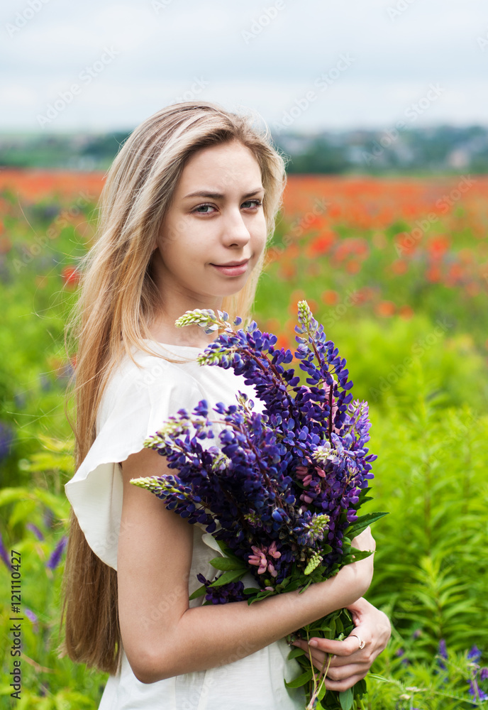 girl with bouquet of lupine flowers girl with bouquet of lupine flowers