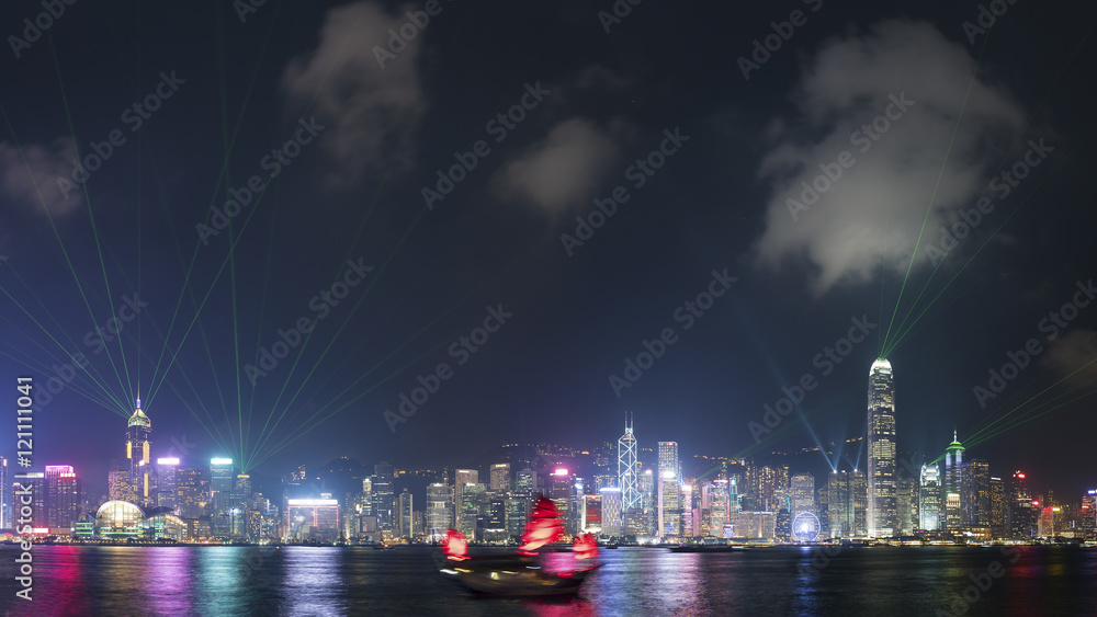 Laser show in Victoria Harbor of Hong Kong city at night Laser show in Victoria Harbor of Hong Kong city at night