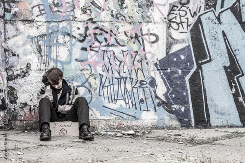 Homeless man praying for home
