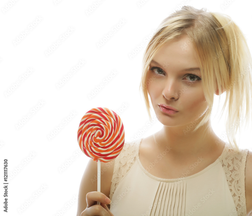 Young blond woman with candy
