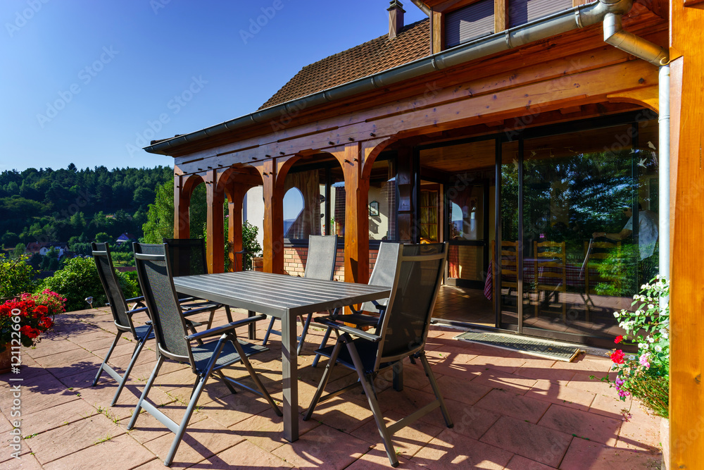 Beautiful guesthouse with terrace in Alsace, France. Alpine styl Beautiful guesthouse with terrace in Alsace, France. Alpine styl