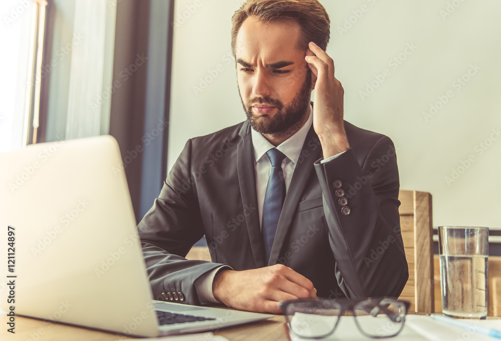 Attractive businessman working Attractive businessman working