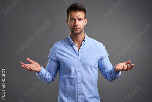 Fotografie An uncomprehending young man