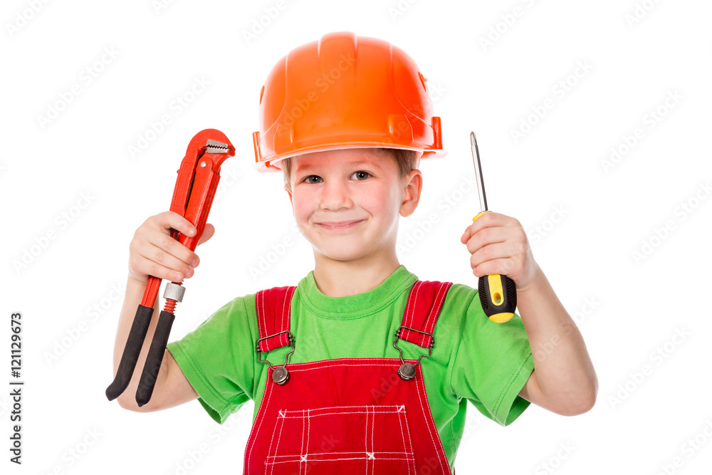 Little builder in helmet with wrench and screwdriver Little builder in helmet with wrench and screwdriver