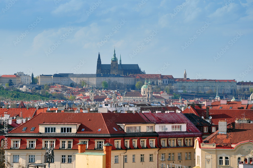 Obraz premium Aerial panoramic view of the historic center of Prague, Czech Republic. Red tiled roofs and Church of St. Vitus in perspective.