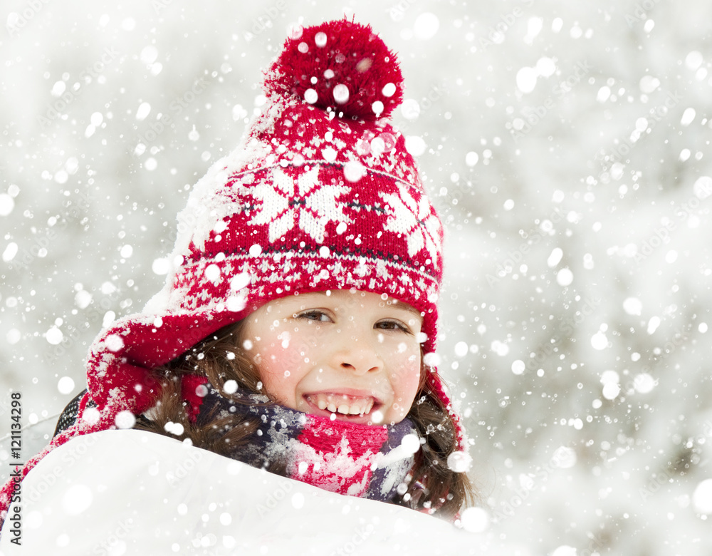 Active child playing outdoors in winter Active child playing outdoors in winter