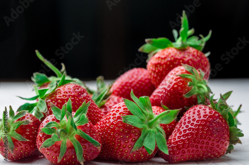 Fresh strawberry background. Ripe in close-up.
