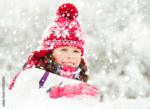 Active child playing outdoors in winter