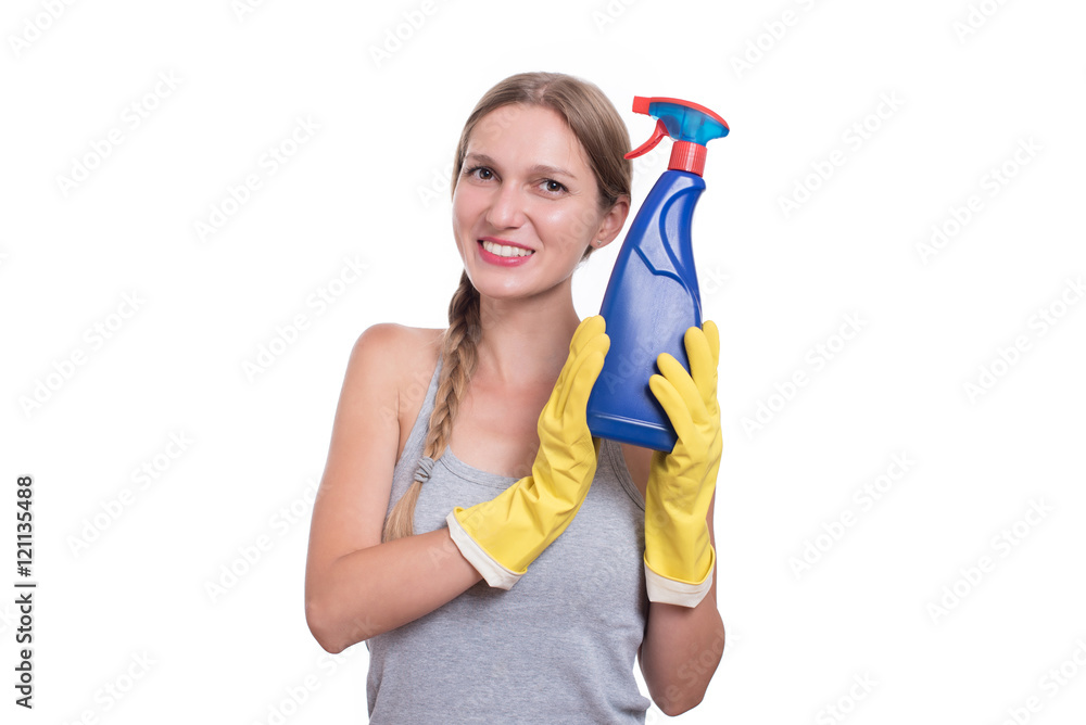 Smiling woman holding bottle of chemistry for cleaning house Smiling woman holding bottle of chemistry for cleaning house