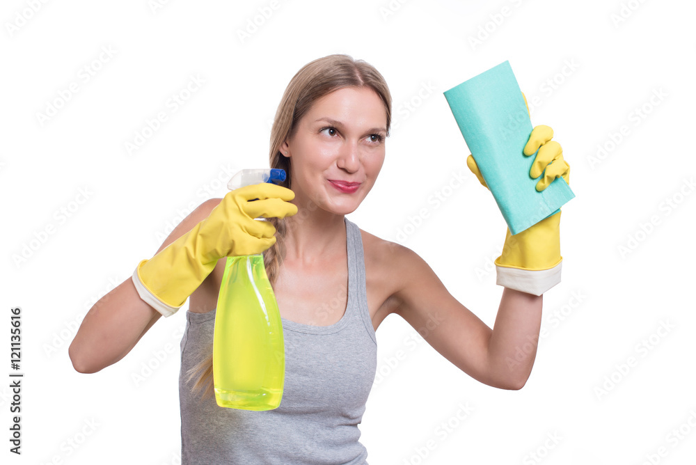 Young cheerful woman cleaning with rag, isolated on white Young cheerful woman cleaning with rag, isolated on white