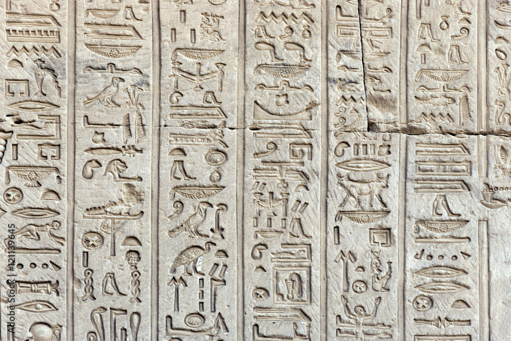 Ancient Egyptian hieroglyphs on the wall of the Temple of Hathor Stock ...
