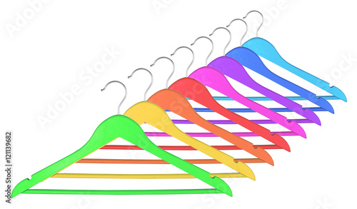 Colorful clothes hangers isolated on a white background