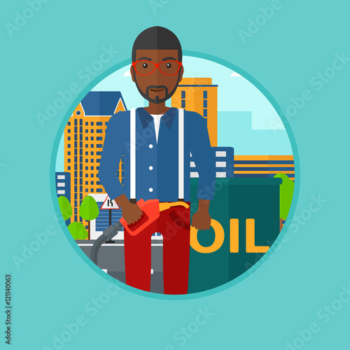 Man with oil barrel and gas pump nozzle.