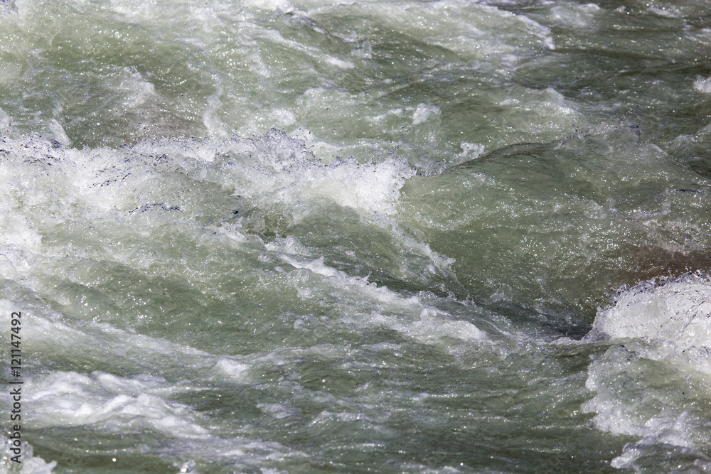 Fototapeta premium rough water in a mountain river