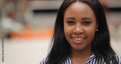 Young black woman in city smile happy face portrait Free Download Young black woman in city smile happy face portrait - GFXLoad