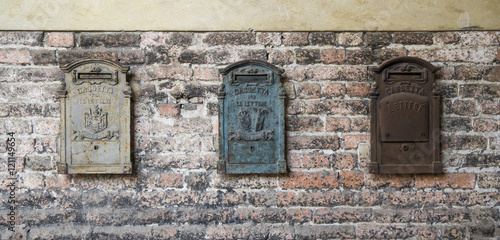 3 old italian post boxes