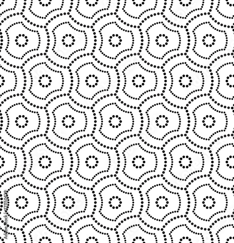Vector seamless texture. Modern abstract background. Repeating pattern with hexagonal tiles, filled with dots.