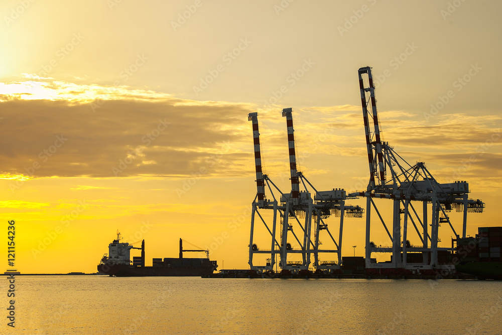 Cargo ship loaded in the shipping container terminal, Cargo container ship for shipping concept in sunse