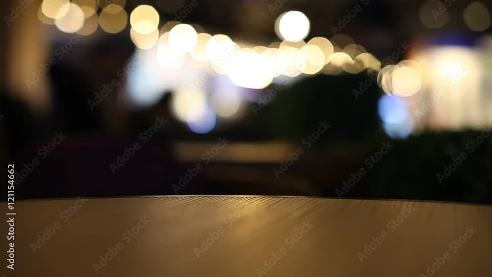 on the table at cafe blurred background