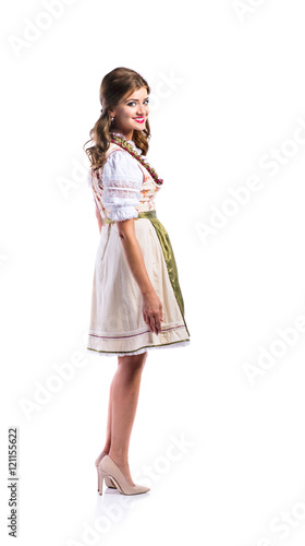 Beautiful woman in traditional bavarian dress, studio shot, isol