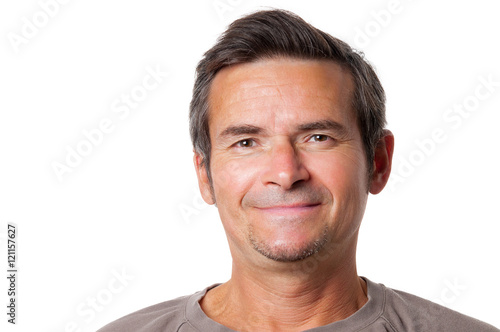 Smiling adult man studio portrait