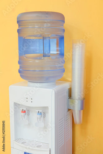The image of a water cooler in an office