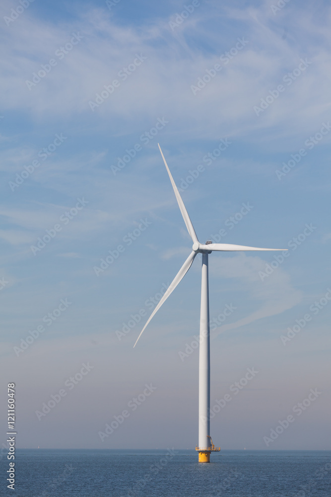 View of single windturbine in the Dutch Noordoostpolder, Flevola