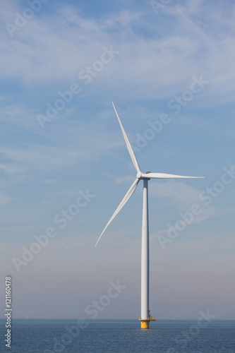 View of single windturbine in the Dutch Noordoostpolder, Flevola