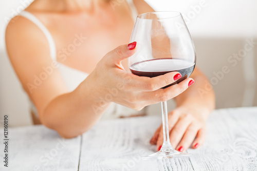 woman enjoying red wine savouring the bouquet