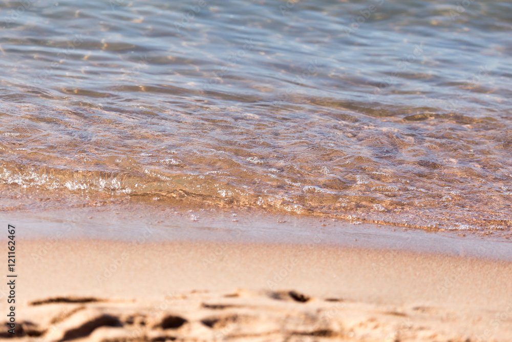 sandy shore of the sea as a backdrop