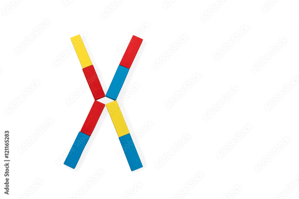 Letter X is folded of wooden blocks Letter X is folded of wooden blocks