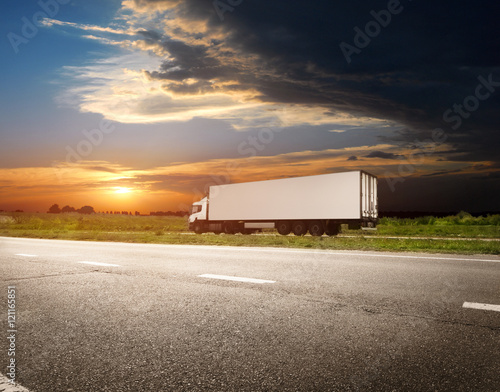 Fototapeta Highway transportation with cars and Truck