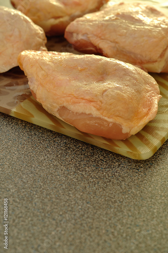 Pieces of raw chicken