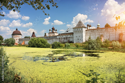 Монастырь у пруда Monastery near the pond photo