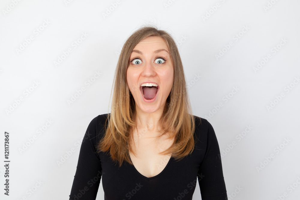 Young woman is very surprised Young woman is very surprised