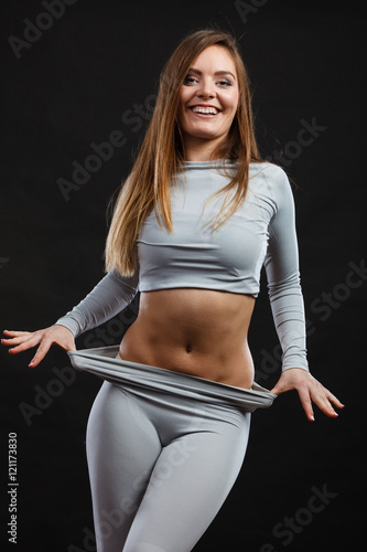 Sporty woman wearing thermoactive underwear. © Voyagerix