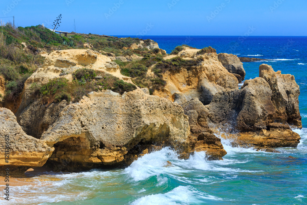 Atlantic rocky coast view (Algarve, Portugal).