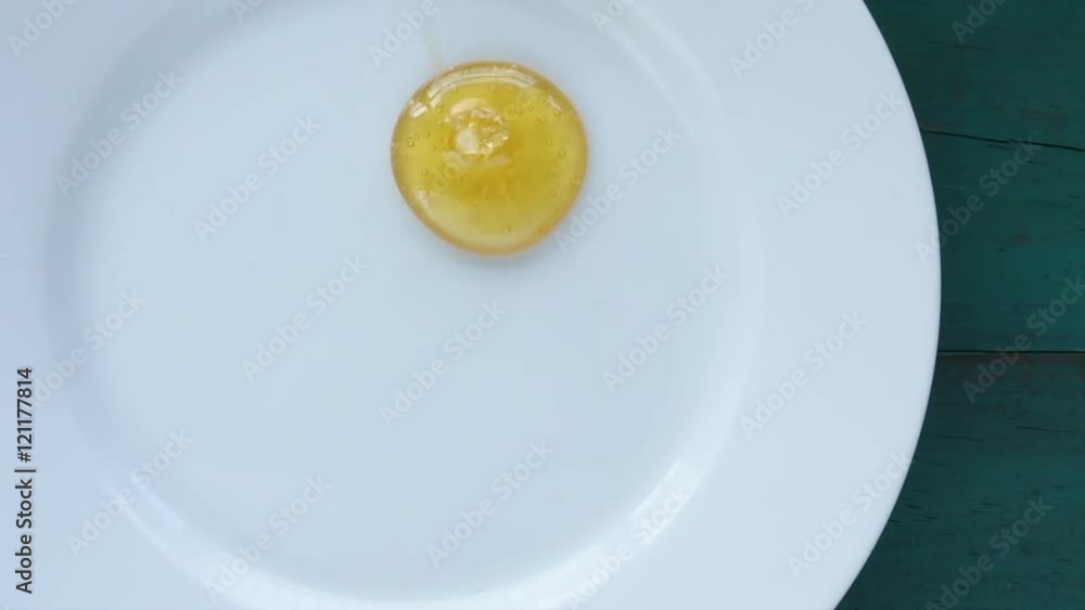 Honey and a red apple served on Rosh HaShanah, The Jewish New Year holiday background with copy space Honey and a red apple served on Rosh HaShanah, The Jewish New Year holiday background with copy space