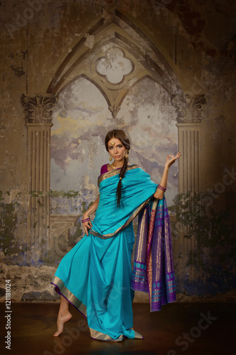 Beautiful young woman in traditional indian clothing