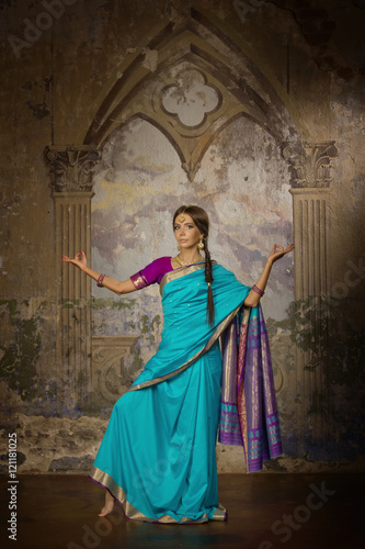 Beautiful young woman in traditional indian clothing