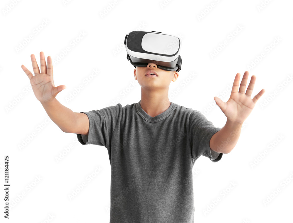 African-American boy wearing virtual reality glasses on white background African-American boy wearing virtual reality glasses on white background