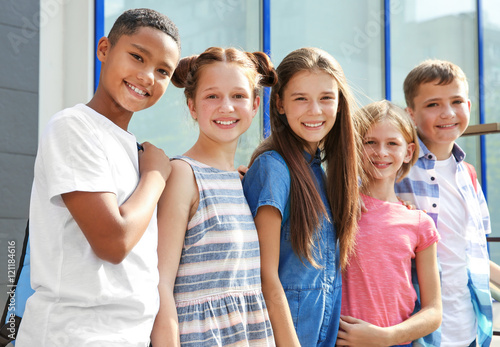 Group of pupils standing ou...