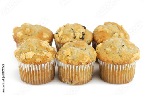 fresh muffins isolated on white background