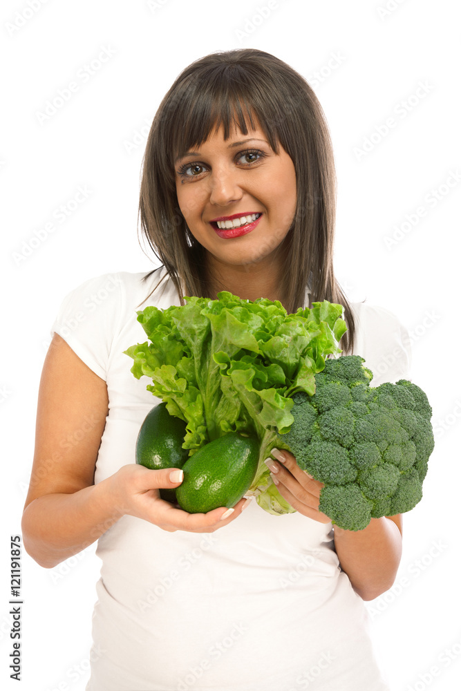 Young woman holding broccoli, avocado and lettuce salad isolated