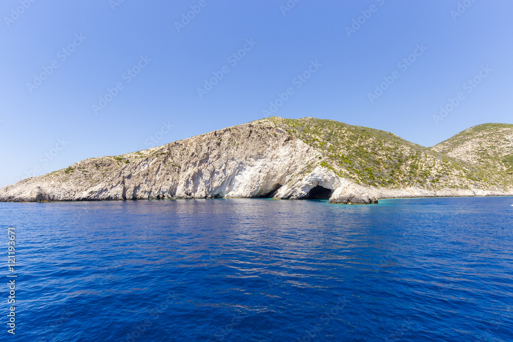 Blue sea caves on Zakynthos island, Greece, with crystal clear waters