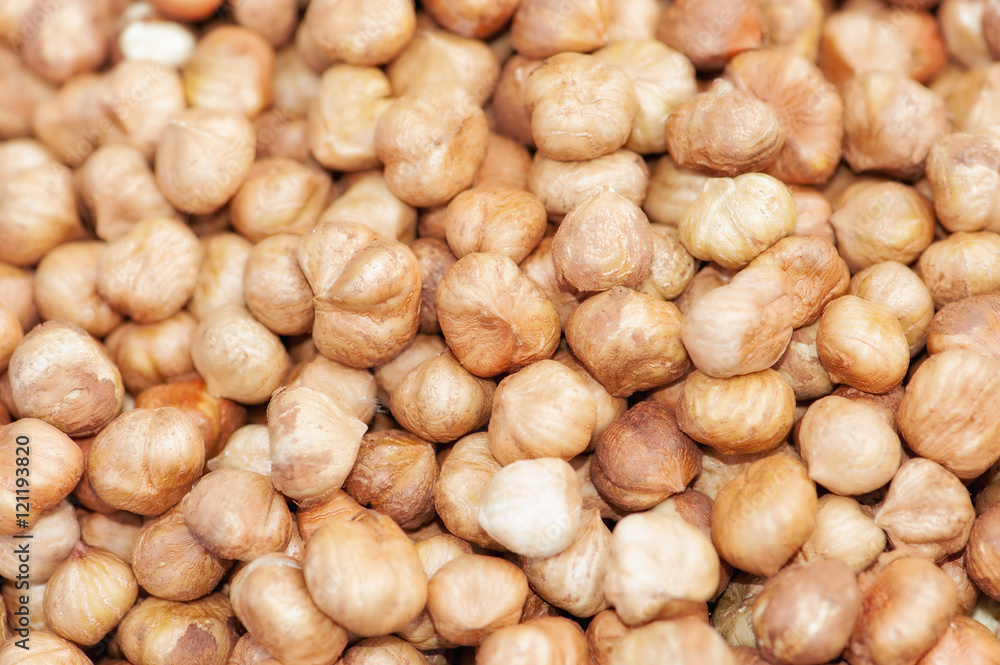 Heap of peeled hazelnuts, hazelnut as background Heap of peeled hazelnuts, hazelnut as background