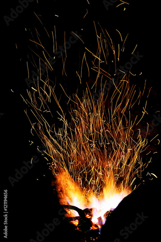 Smithy fire flame tips with sparks closeup