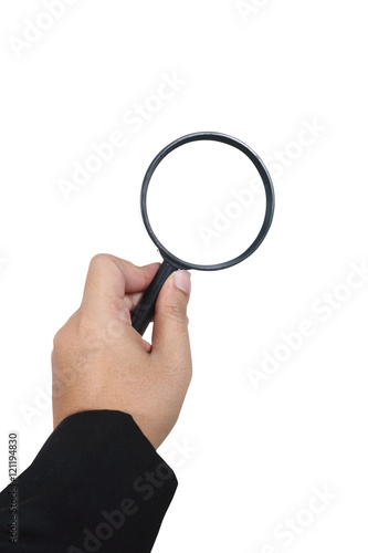 Business hand holding magnifying glass isolated on white backgro