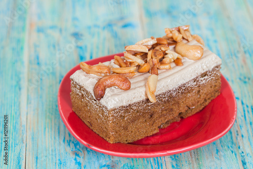 Wallpaper Mural Coffee cake with cashew nut on wood table Torontodigital.ca