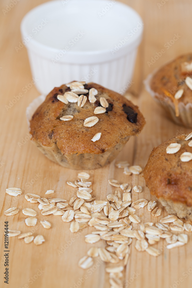 Fototapeta premium Banana cup cake with oat flakes